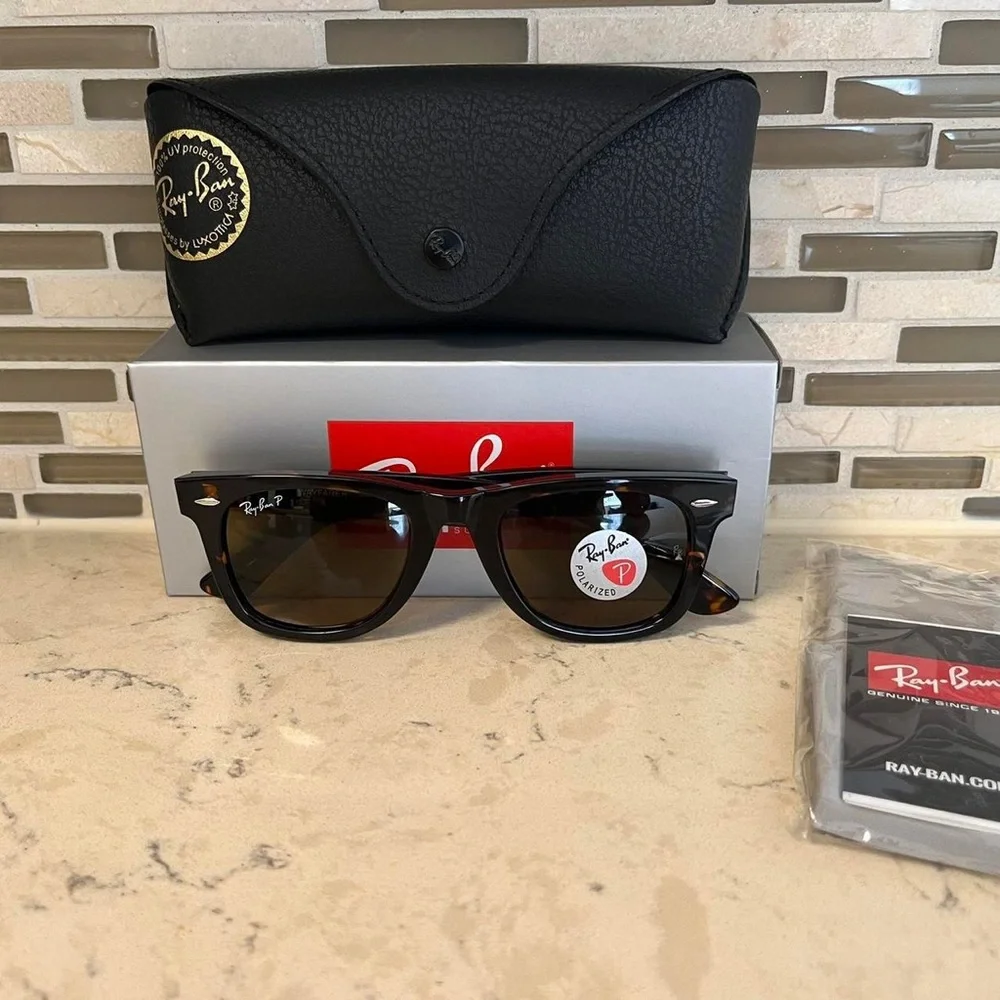 Ray-Ban Wayfarer Classic Black and Brown Polarized Sunglasses.